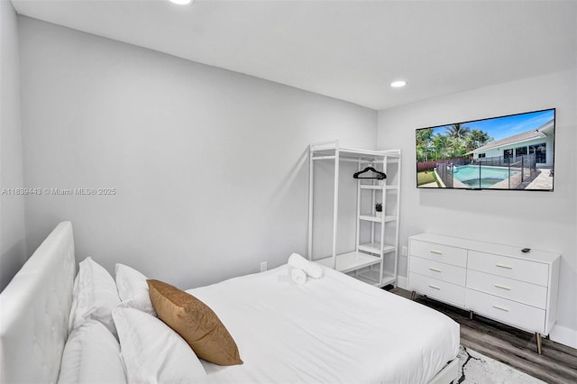 614 SE 12th Ave, Deerfield Beach, FL 33441 - bedroom with wood finished floors and recessed lighting