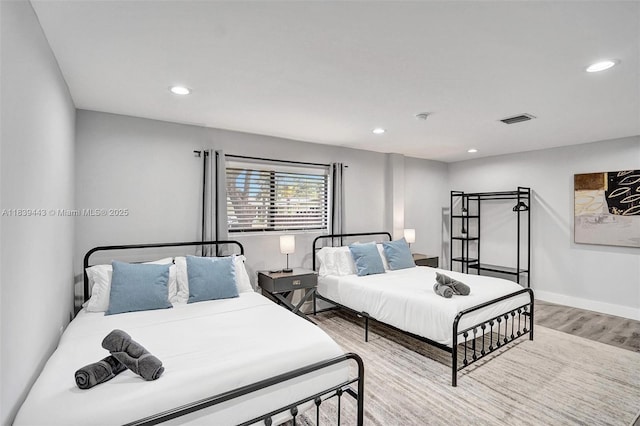 614 SE 12th Ave, Deerfield Beach, FL 33441 - bedroom with wood finished floors and recessed lighting