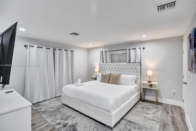 614 SE 12th Ave, Deerfield Beach, FL 33441 - bedroom featuring wood finished floors and recessed lighting