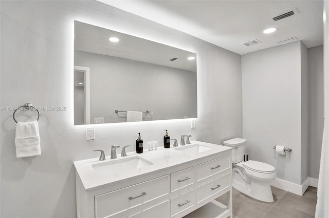 614 SE 12th Ave, Deerfield Beach, FL 33441 - bathroom with double vanity, recessed lighting, and tile patterned floors