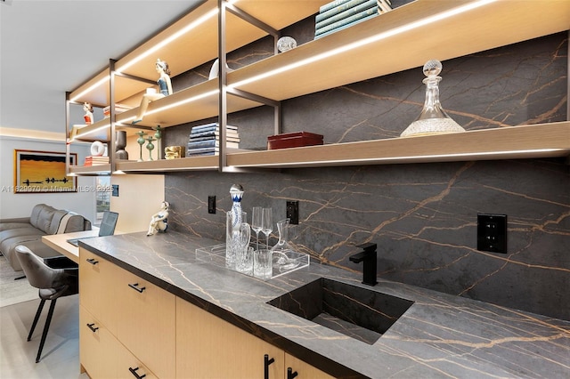 2301 Collins Ave Unit 1004/1003, Miami Beach, FL 33139 - bar area with a sink and decorative backsplash