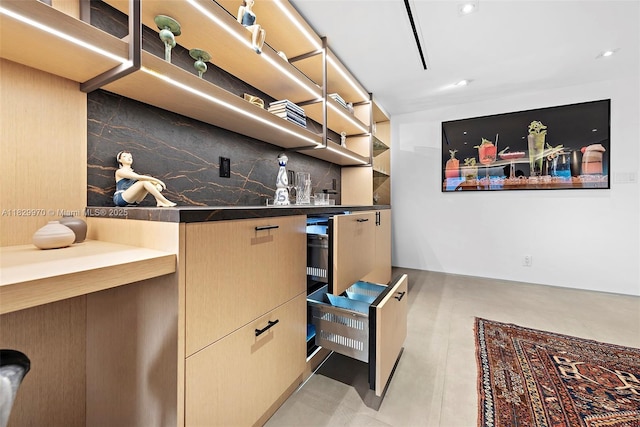 2301 Collins Ave Unit 1004/1003, Miami Beach, FL 33139 - indoor wet bar with tasteful backsplash and finished concrete floors
