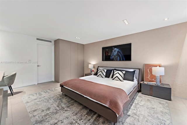 2301 Collins Ave Unit 1004/1003, Miami Beach, FL 33139 - bedroom featuring light tile patterned flooring and recessed lighting