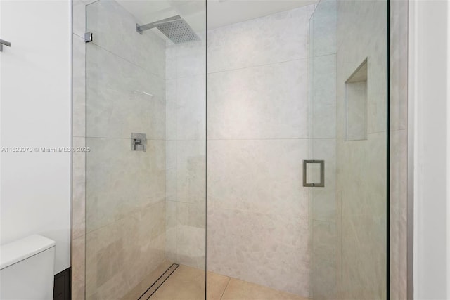 2301 Collins Ave Unit 1004/1003, Miami Beach, FL 33139 - bathroom with a shower stall and toilet
