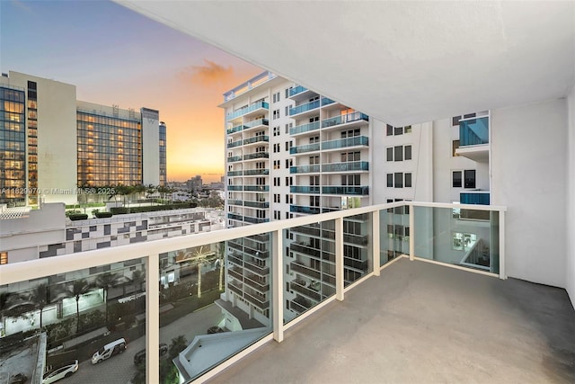 2301 Collins Ave Unit 1004/1003, Miami Beach, FL 33139 - balcony at dusk with a view of city