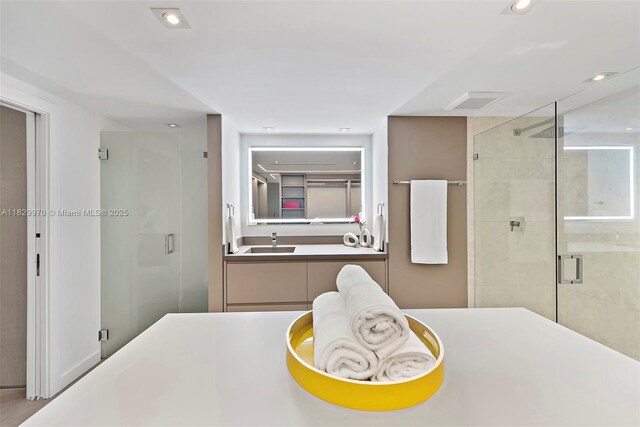 2301 Collins Ave Unit 1004/1003, Miami Beach, FL 33139 - bathroom featuring a shower stall and recessed lighting