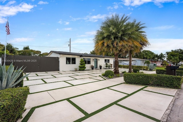 8115 NW 185th Ter, Hialeah, FL 33015 - ranch-style house featuring a gate and stucco siding