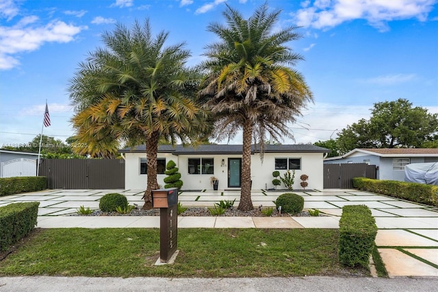 8115 NW 185th Ter, Hialeah, FL 33015 - single story home featuring driveway, a gate, and stucco siding