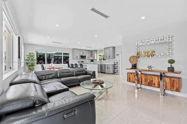 8115 NW 185th Ter, Hialeah, FL 33015 - living room with recessed lighting