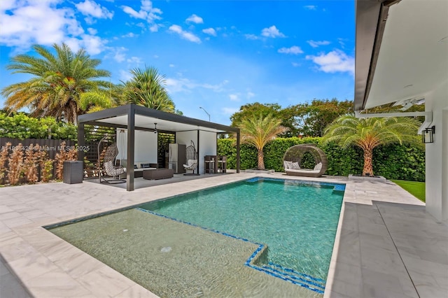 8115 NW 185th Ter, Hialeah, FL 33015 - view of swimming pool featuring a gazebo, a patio, an outdoor hangout area, and a fenced backyard