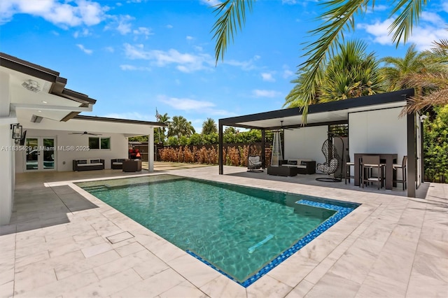 8115 NW 185th Ter, Hialeah, FL 33015 - view of swimming pool with an outdoor hangout area, a ceiling fan, a patio area, and a gazebo