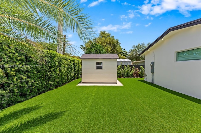 8115 NW 185th Ter, Hialeah, FL 33015 - view of grassy yard featuring a shed