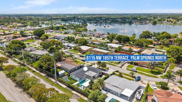 8115 NW 185th Ter, Hialeah, FL 33015 - aerial view of residential area with a nearby body of water