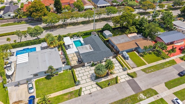 8115 NW 185th Ter, Hialeah, FL 33015 - aerial perspective of suburban area featuring a pool