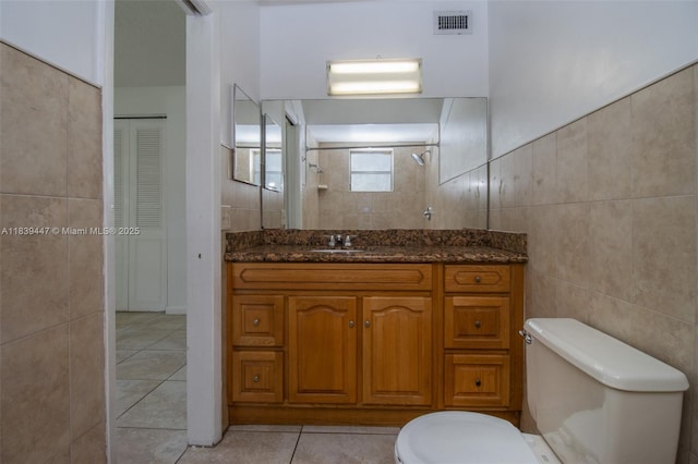 9443 SW 174th St Unit 9443, Palmetto Bay, FL 33157 - full bathroom with tile walls, tile patterned flooring, vanity, and tiled shower