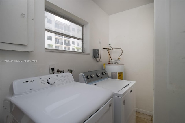 9443 SW 174th St Unit 9443, Palmetto Bay, FL 33157 - washroom featuring separate washer and dryer and electric water heater