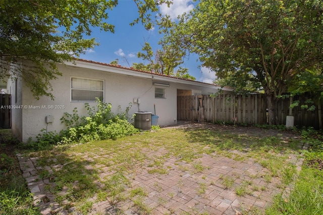9443 SW 174th St Unit 9443, Palmetto Bay, FL 33157 - view of yard with a patio