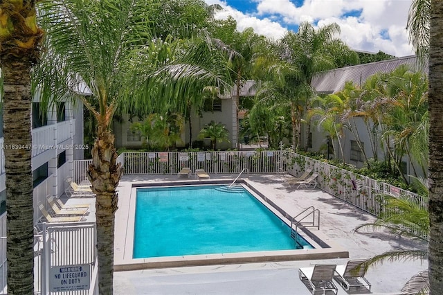 9443 SW 174th St Unit 9443, Palmetto Bay, FL 33157 - community pool with a patio