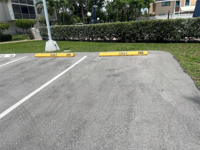 2821 N Miami Beach Blvd Unit 2E, North Miami Beach, FL 33160 - view of uncovered parking lot