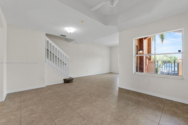 3066 S Red Mangrove Ln S Unit 201-2, Dania Beach, FL 33312 - tiled empty room featuring stairs and a ceiling fan