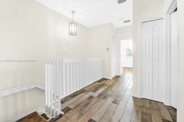 3066 S Red Mangrove Ln S Unit 201-2, Dania Beach, FL 33312 - hall with wood finished floors and baseboards