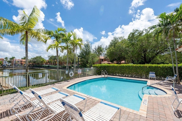3066 S Red Mangrove Ln S Unit 201-2, Dania Beach, FL 33312 - community pool featuring a patio and a water view