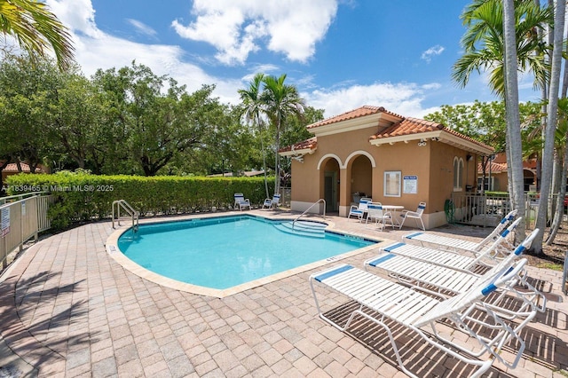 3066 S Red Mangrove Ln S Unit 201-2, Dania Beach, FL 33312 - community pool with a patio area
