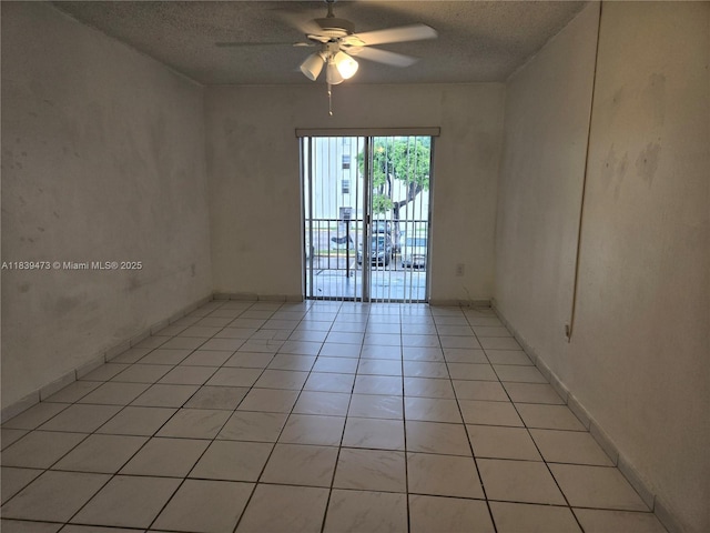 5755 W 20th Ave Unit 206, Hialeah, FL 33012 - empty room featuring a ceiling fan, a textured ceiling, and light tile patterned flooring