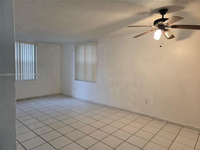 5755 W 20th Ave Unit 206, Hialeah, FL 33012 - unfurnished room with a textured ceiling, light tile patterned floors, and ceiling fan