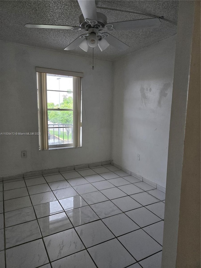 5755 W 20th Ave Unit 206, Hialeah, FL 33012 - spare room with ceiling fan and light tile patterned flooring