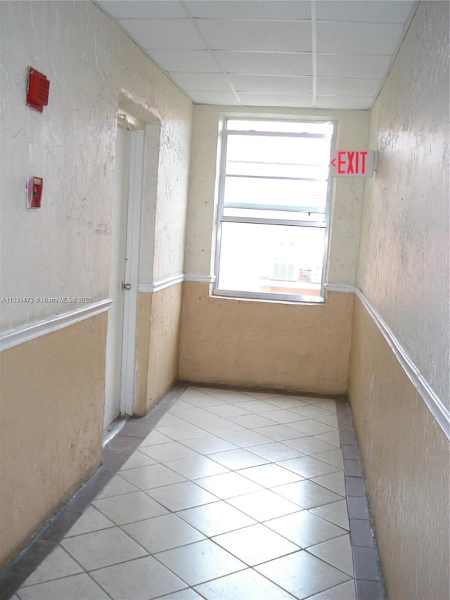 5755 W 20th Ave Unit 206, Hialeah, FL 33012 - unfurnished room featuring light tile patterned floors and a paneled ceiling