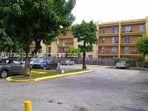 5755 W 20th Ave Unit 206, Hialeah, FL 33012 - view of asphalt street featuring curbs