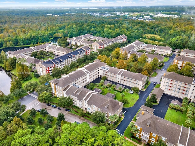 1231 Wright Cir Unit 108, Kissimmee, FL 34747 - drone / aerial view of a heavily wooded area