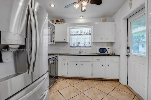 5300 Washington St Unit C113, Hollywood, FL 33021 - kitchen featuring stainless steel fridge with ice dispenser, dark countertops, plenty of natural light, stove, and recessed lighting