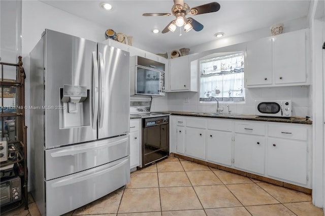 5300 Washington St Unit C113, Hollywood, FL 33021 - kitchen with appliances with stainless steel finishes, dark countertops, a ceiling fan, white cabinets, and recessed lighting