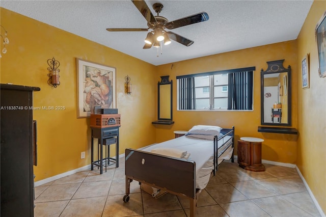 5300 Washington St Unit C113, Hollywood, FL 33021 - bedroom with a textured ceiling, tile patterned flooring, and a ceiling fan