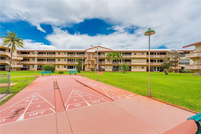 5300 Washington St Unit C113, Hollywood, FL 33021 - view of property's community with a lawn and shuffleboard