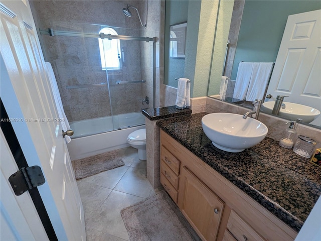 1900 Oceanwalk Ln Unit 123, Lauderdale By The Sea, FL 33062 - bathroom with vanity, combined bath / shower with glass door, and tile patterned flooring