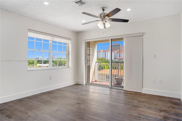37 Majorca Ave Unit 401, Coral Gables, FL 33134 - empty room featuring wood finished floors, a ceiling fan, recessed lighting, and a textured ceiling