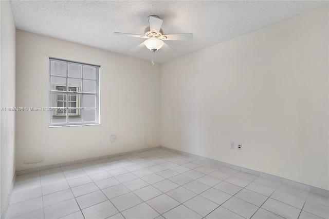 37 Majorca Ave Unit 401, Coral Gables, FL 33134 - unfurnished room featuring a ceiling fan, a textured ceiling, and light tile patterned floors