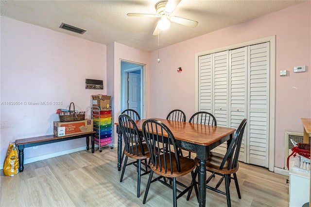 3991 NW 108th Ave, Coral Springs, FL 33065 - dining space with ceiling fan and light wood finished floors