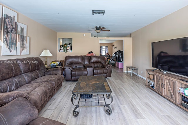 3991 NW 108th Ave, Coral Springs, FL 33065 - living room with a ceiling fan and wood finished floors