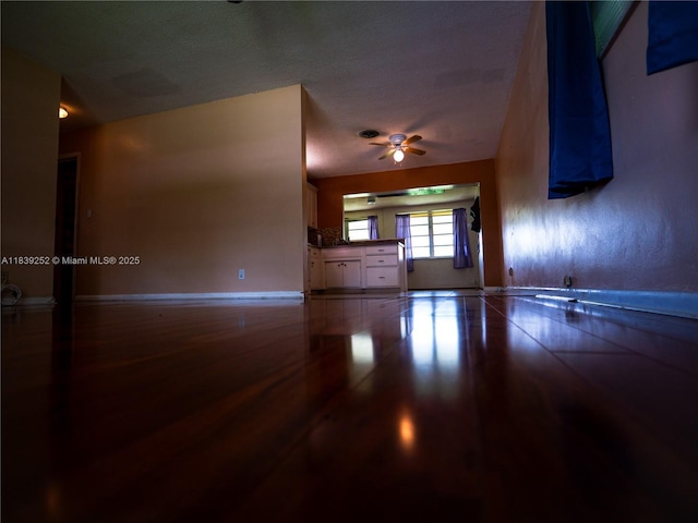 2918 NW 46th St, Tamarac, FL 33309 - unfurnished living room with ceiling fan and wood finished floors