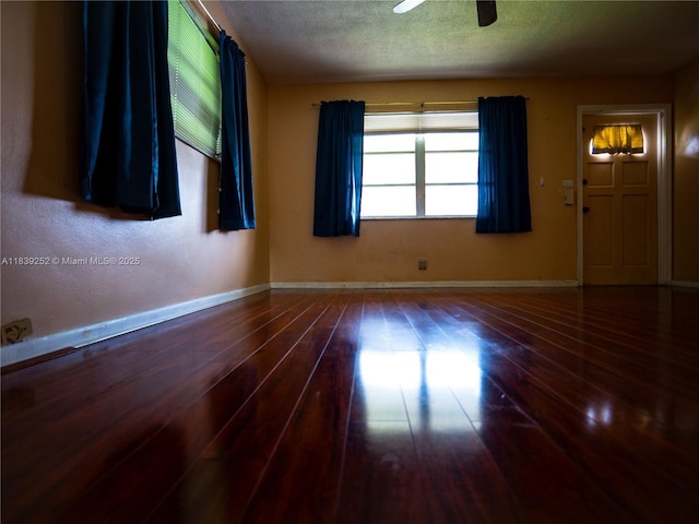 2918 NW 46th St, Tamarac, FL 33309 - spare room featuring ceiling fan, wood-type flooring, and a textured ceiling