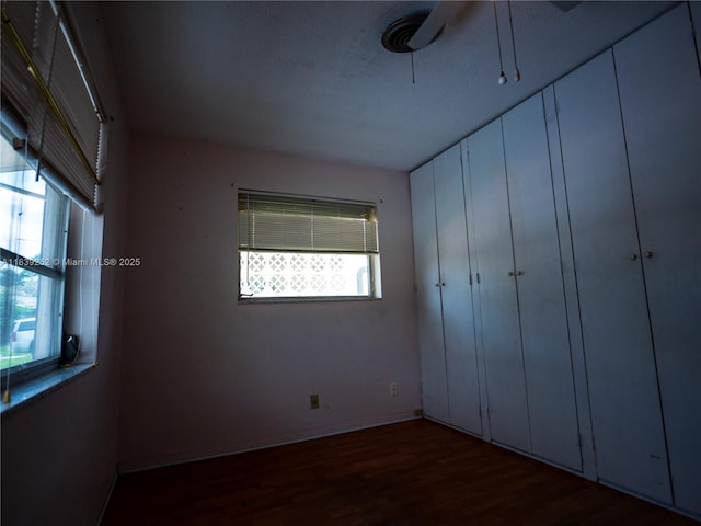 2918 NW 46th St, Tamarac, FL 33309 - unfurnished bedroom with wood finished floors and baseboards