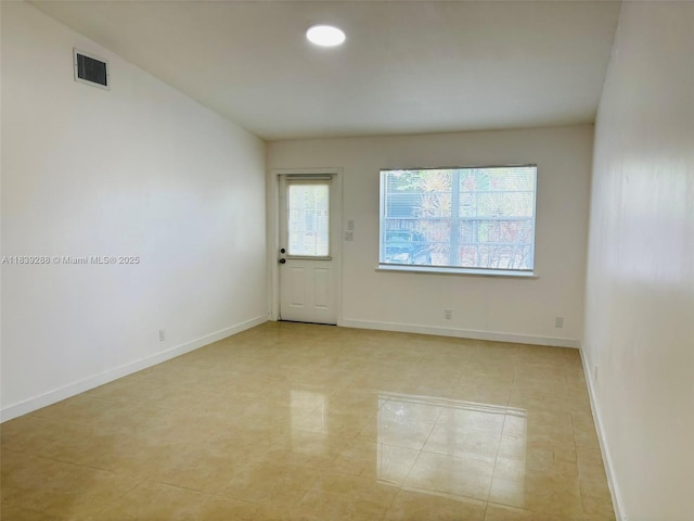4710 NW 3rd Ter, Deerfield Beach, FL 33064 - unfurnished room with light tile patterned flooring and baseboards