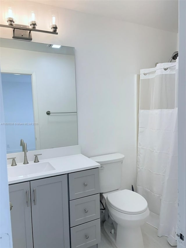 4710 NW 3rd Ter, Deerfield Beach, FL 33064 - bathroom with vanity and a shower with shower curtain