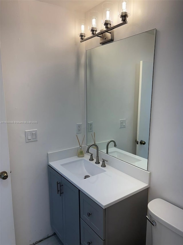 4710 NW 3rd Ter, Deerfield Beach, FL 33064 - half bathroom featuring vanity and toilet