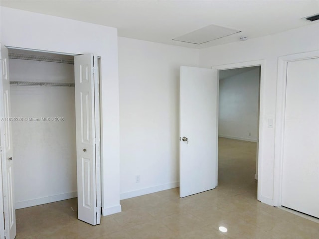 4710 NW 3rd Ter, Deerfield Beach, FL 33064 - unfurnished bedroom featuring baseboards and a closet