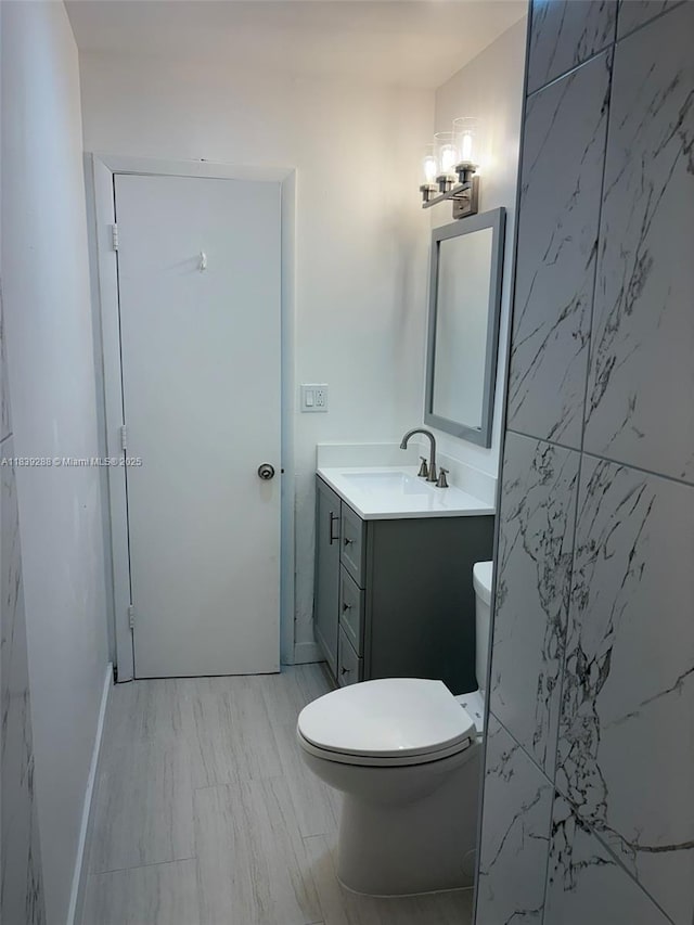4710 NW 3rd Ter, Deerfield Beach, FL 33064 - bathroom with vanity and a chandelier